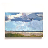 Wolken boven het strand